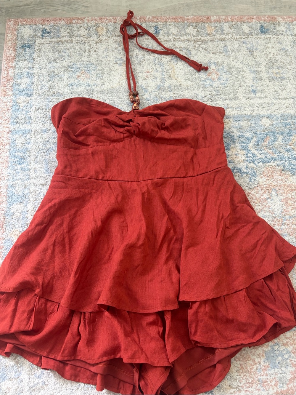 Francesca’s Burnt Orange Flowy Romper